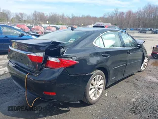 2014 Lexus ES 300h with VIN JTHBW1GG5E2066621, listed as a IAAI auction lot 42008057 with Not Provided miles and . Bid and sale history available at DreamBid. Image 4.