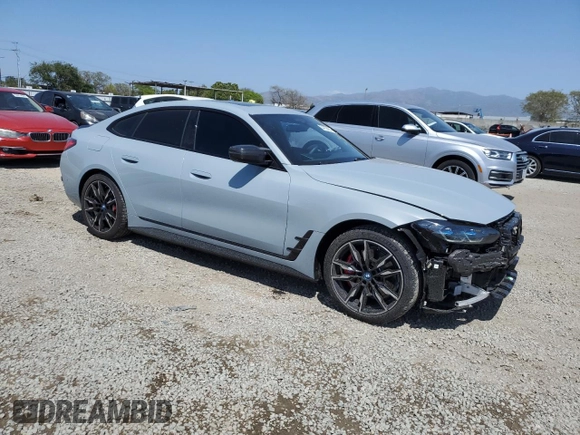 2024 BMW i4 M50 with VIN WBY33AW00RFR75589, listed as a Copart auction lot 54159955 with 8,113 mi miles and Salvage Title. Bid and sale history available at carsss.com. Image 4.