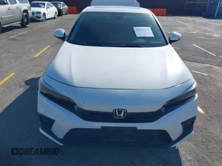 2024 Honda Civic Touring z VIN 2HGFE1F93RH303145, wystawiony jako IAAI lot #41975369 z przebiegiem 32 644 mil mil oraz . Historia ofert i sprzedaży dostępna na DreamBid. Obrazek 12.
