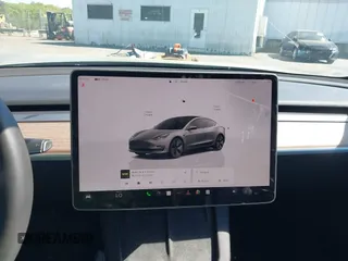 2023 Tesla Model 3 with VIN 5YJ3E1EA6PF645110, listed as a IAAI auction lot 42044357 with 24,352 mi miles and . Bid and sale history available at DreamBid. Image 18.