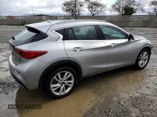 2018 Infiniti QX30 Premium with VIN SJKCH5CP0JA048053, listed as a Copart auction lot 48202385 with 90,578 mi miles and Salvage title. Bid and sale history available at DreamBid. Image 3.