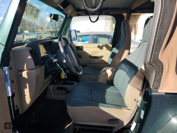2001 Jeep Wrangler Sahara with VIN 1J4FA59S31P324555, listed as a Copart auction lot 80100734 with 136,973 mi miles and Clean Title. Bid and sale history available at carsss.com. Image 7.