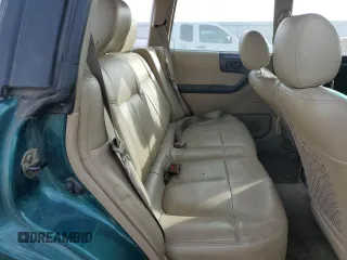 1999 Subaru Forester S with VIN JF1SF6550XH706594, listed as a Copart auction lot 76917554 with 215,297 mi miles and Clean Title. Bid and sale history available at carsss.com. Image 11.