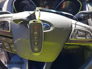 2018 Ford Focus Titanium with VIN 1FADP3N24JL279449, listed as a IAAI auction lot 42297780 with 144,479 mi miles and . Bid and sale history available at DreamBid. Image 11.