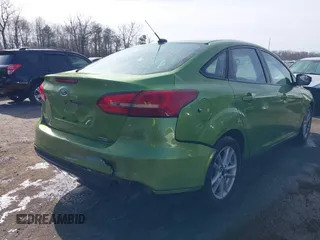 2018 Ford Focus SE with VIN 1FADP3FE7JL237818, listed as a IAAI auction lot 41729205 with 66,702 mi miles. Bid and sale history available at carsss.com. Image 6.