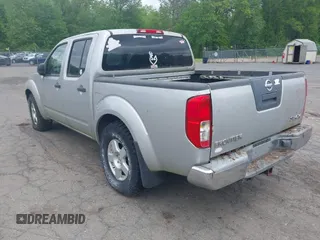 2006 Nissan Frontier SE with VIN 1N6AD07W66C451179, listed as a IAAI auction lot 42320667 with 210,610 mi miles and . Bid and sale history available at DreamBid. Image 3.