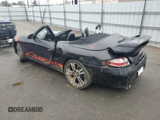 1999 Porsche 911 z VIN WP0CA2990XS651649, wystawiony jako Copart lot #45002045 z przebiegiem Nie podano mil oraz Szkoda całkowita • Salvage title. Historia ofert i sprzedaży dostępna na DreamBid. Obrazek 2.