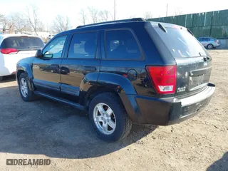 2006 Jeep Grand Cherokee Laredo with VIN 1J4GR48K16C142277, listed as a IAAI auction lot 41598878 with 169,236 mi miles. Bid and sale history available at carsss.com. Image 3.