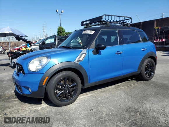 2013 MINI Countryman S with VIN WMWZC3C51DWP23167, listed as a Copart auction lot 63933185 with 72,329 mi miles and Salvage title. Bid and sale history available at DreamBid. Image 1.