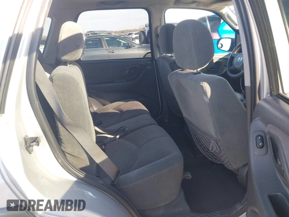 2003 Mazda Tribute LX with VIN 4F2YZ04183KM44733, listed as a IAAI auction lot 41472662 with 246,522 mi miles and . Bid and sale history available at DreamBid. Image 8.