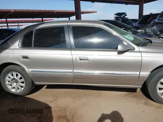 2002 Lincoln Continental with VIN 1LNHM97V62Y696179, listed as a IAAI auction lot 41745567 with 110,514 mi miles and . Bid and sale history available at DreamBid. Image 13.