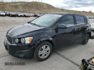 2012 Chevrolet Sonic LT with VIN 1G1JC6SB7C4200604, listed as a Copart auction lot 52843945 with 101,039 mi miles and Salvage Title. Bid and sale history available at carsss.com. Image 1.