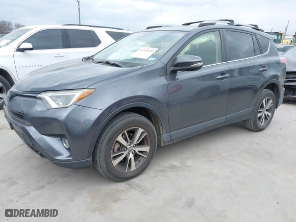 2018 Toyota RAV4 XLE with VIN JTMWFREV4JD110397, listed as a IAAI auction lot 41703342 with 93,206 mi miles. Bid and sale history available at carsss.com. Image 17.