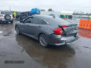 2019 Honda Civic Sedan EX with VIN 19XFC1F31KE002777, listed as a IAAI auction lot 41571361 with 115,277 mi miles. Bid and sale history available at carsss.com. Image 3.
