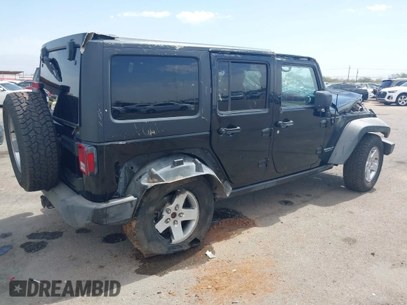 2011 Jeep Wrangler Unlimited Rubicon with VIN 1J4BA6H15BL580301, listed as a IAAI auction lot 42673014 with Not provided miles and . Bid and sale history available at DreamBid. Image 4.