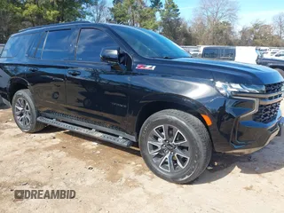 2022 Chevrolet Tahoe Z71 z VIN 1GNSKPKD1NR185780, wystawiony jako IAAI lot #41301544 z przebiegiem 54 359 mil mil oraz . Historia ofert i sprzedaży dostępna na DreamBid. Obrazek 1.