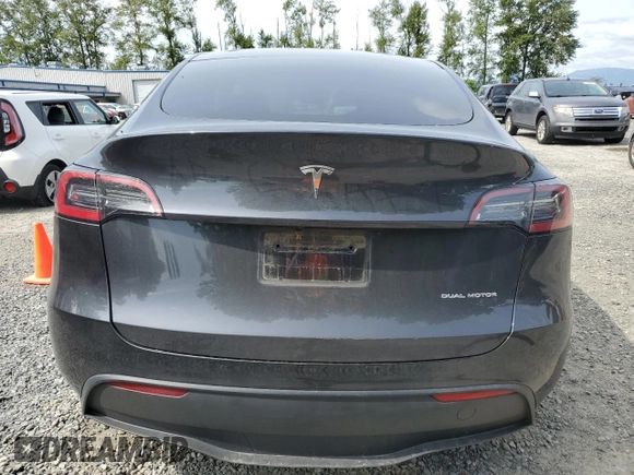 2024 Tesla Model Y Long Range z VIN 7SAYGDEE8RF986258, wystawiony jako Copart lot #58434275 z przebiegiem 59 934 mil mil oraz Szkoda całkowita • Salvage title. Historia ofert i sprzedaży dostępna na DreamBid. Obrazek 6.