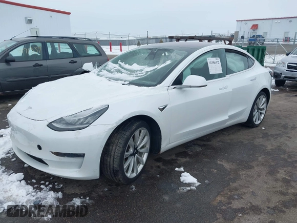 2018 Tesla Model 3 Long Range Battery with VIN 5YJ3E1EB2JF089006, listed as a IAAI auction lot 41186372 with Not Provided miles and . Bid and sale history available at DreamBid. Image 18.
