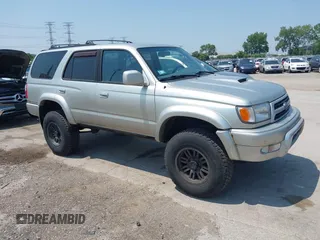 2000 Toyota 4Runner SR5 z VIN JT3HN86R5Y0273590, wystawiony jako IAAI lot #42489755 z przebiegiem 208 497 mil mil oraz . Historia ofert i sprzedaży dostępna na DreamBid. Obrazek 1.