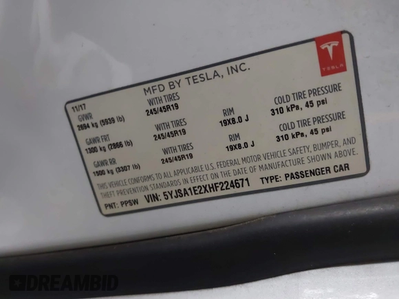 2017 Tesla Model S 100D z VIN 5YJSA1E2XHF224671, wystawiony jako IAAI lot #42665581 z przebiegiem 128 517 mil mil oraz . Historia ofert i sprzedaży dostępna na DreamBid. Obrazek 9.