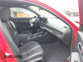 2022 Honda Civic Sport z VIN 2HGFE2F51NH534607, wystawiony jako IAAI lot #41938903 z przebiegiem 32 554 mil mil oraz . Historia ofert i sprzedaży dostępna na DreamBid. Obrazek 5.