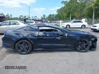 2021 Ford Mustang GT z VIN 1FA6P8CF9M5101993, wystawiony jako IAAI lot #42152731 z przebiegiem 25 699 mil mil oraz . Historia ofert i sprzedaży dostępna na DreamBid. Obrazek 13.