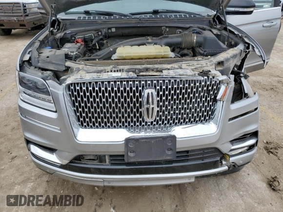 2020 Lincoln Navigator with VIN 5LMJJ2NT0LEL09760, listed as a Copart auction lot 86628254 with 118,733 mi miles and Salvage title. Bid and sale history available at DreamBid. Image 12.