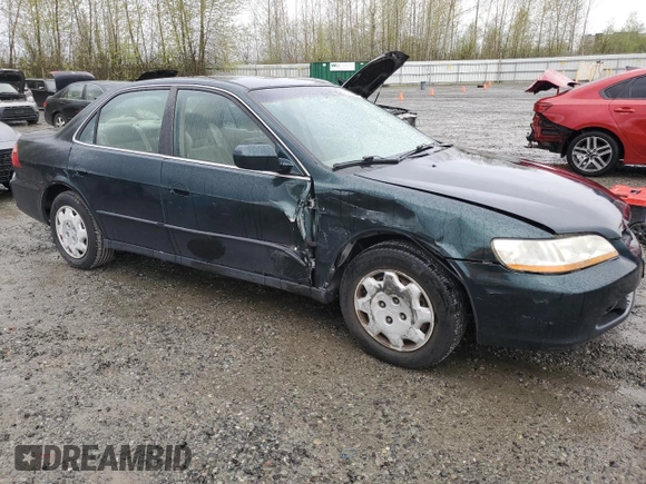 2000 Honda Accord LX z VIN 1HGCG5648YA154043, wystawiony jako Copart lot #51854515 z przebiegiem 176 150 mil mil oraz Szkoda całkowita • Salvage title. Historia ofert i sprzedaży dostępna na DreamBid. Obrazek 4.