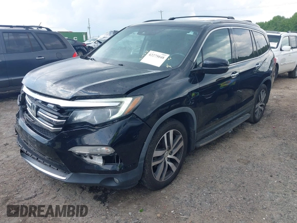 2017 Honda Pilot Touring with VIN 5FNYF5H99HB037126, listed as a IAAI auction lot 42275048 with 164,289 mi miles and . Bid and sale history available at DreamBid. Image 17.