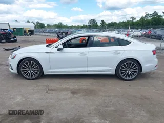 2018 Audi A5 Sportback Prestige z VIN WAUCNCF53JA018391, wystawiony jako IAAI lot #42350981 z przebiegiem 64 620 mil mil oraz . Historia ofert i sprzedaży dostępna na DreamBid. Obrazek 14.