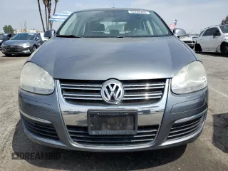 2007 Volkswagen Jetta Wolfsburg Edition z VIN 3VWEG71K07M125028, wystawiony jako Copart lot #53206765 z przebiegiem 53 735 mil mil oraz Czysty tytuł • Clean title. Historia ofert i sprzedaży dostępna na DreamBid. Obrazek 5.