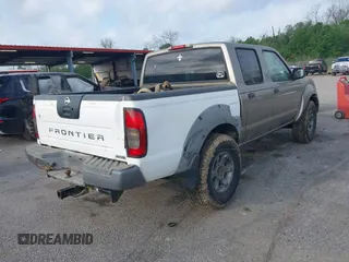 2003 Nissan Frontier XE z VIN 1N6ED27T13C404348, wystawiony jako IAAI lot #41952112 z przebiegiem Nie podano mil oraz . Historia ofert i sprzedaży dostępna na DreamBid. Obrazek 4.