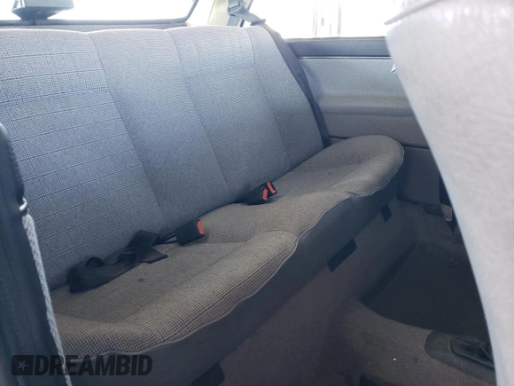1989 Volkswagen Jetta z VIN WVWKB01G2KW684385, wystawiony jako Copart lot #49694065 z przebiegiem 63 792 mil mil oraz Czysty tytuł • Clean title. Historia ofert i sprzedaży dostępna na DreamBid. Obrazek 10.