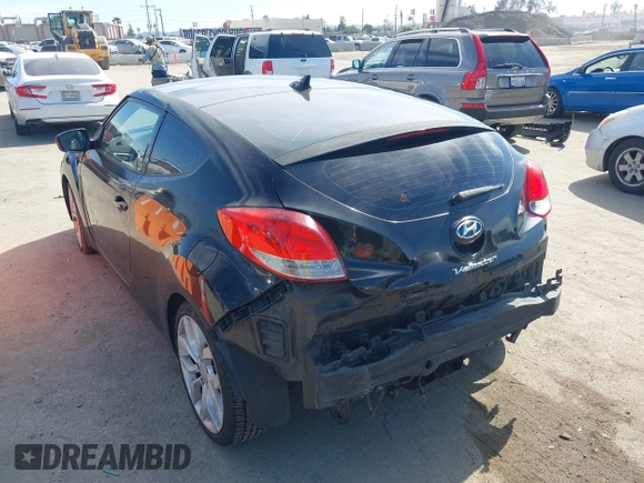 2013 Hyundai Veloster w/Black Int with VIN KMHTC6AD4DU132701, listed as a IAAI auction lot 42021759 with 102,840 mi miles and . Bid and sale history available at DreamBid. Image 3.