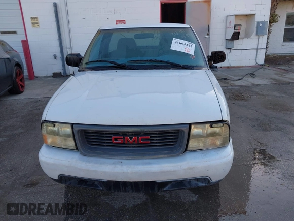 1999 GMC Sonoma with VIN 1GTCS1448XK513781, listed as a IAAI auction lot 41604322 with 216,174 mi miles. Bid and sale history available at carsss.com. Image 6.