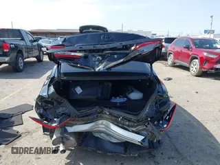 2025 Toyota Camry LE with VIN 4T1DAACK6SU029608, listed as a IAAI auction lot 41571751 with 9,030 mi miles and . Bid and sale history available at DreamBid. Image 16.
