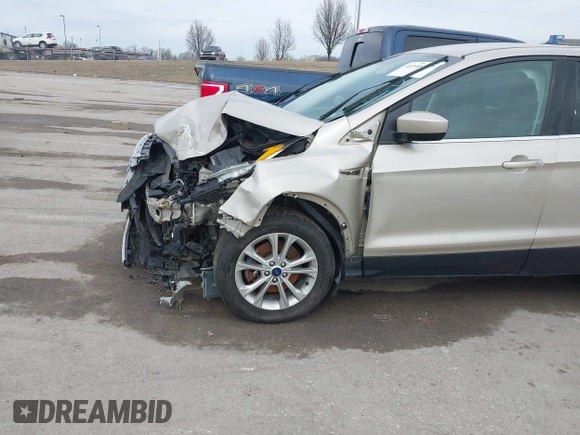 2017 Ford Escape SE with VIN 1FMCU9GD1HUB28732, listed as a IAAI auction lot 41546177 with 126,698 mi miles and . Bid and sale history available at DreamBid. Image 18.