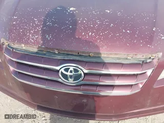 2005 Toyota Avalon XL with VIN 4T1BK36B25U057969, listed as a IAAI auction lot 41798579 with 241,831 mi miles. Bid and sale history available at carsss.com. Image 6.