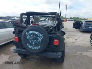 2006 Jeep Wrangler SE with VIN 1J4FA29156P739521, listed as a IAAI auction lot 42563566 with 117,281 mi miles and . Bid and sale history available at DreamBid. Image 16.