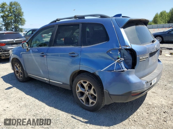 2017 Subaru Forester Touring with VIN JF2SJAWC2HH429099, listed as a Copart auction lot 64671135 with 104,709 mi miles and Salvage title. Bid and sale history available at DreamBid. Image 2.