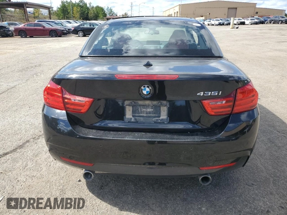 2014 BMW 4 Series 435i with VIN WBA3T3C59EP736749, listed as a Copart auction lot 76011404 with 48,815 mi miles and Salvage title. Bid and sale history available at DreamBid. Image 6.
