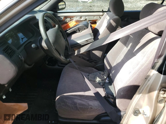 1995 Toyota Corolla DX with VIN 2T1AE09B0SC098739, listed as a Copart auction lot 57653205 with 154,226 mi miles and Salvage title. Bid and sale history available at DreamBid. Image 7.