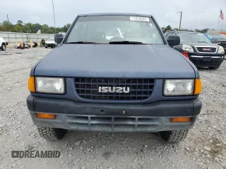 1995 Isuzu Rodeo LS with VIN 4S2CG58V9S4342391, listed as a Copart auction lot 71076344 with 220,708 mi miles and Salvage Title. Bid and sale history available at carsss.com. Image 5.