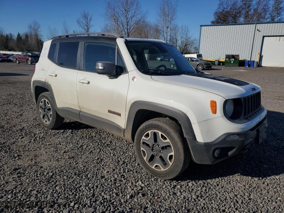2015 Jeep Renegade Trailhawk with VIN ZACCJBCT8FPC19142, listed as a Copart auction lot 42750665 with 128,206 mi miles and Salvage Title. Bid and sale history available at carsss.com. Image 4.