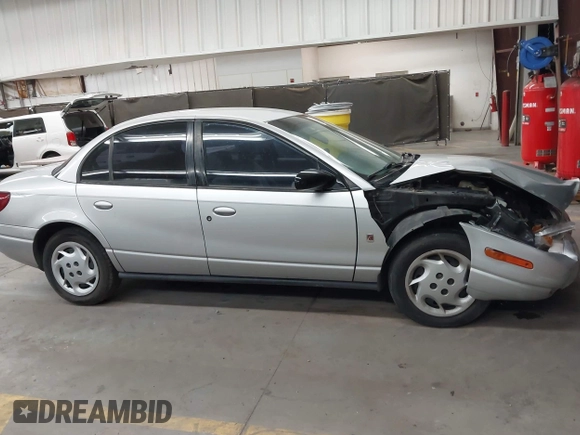 2002 Saturn SL with VIN 1G8ZK54762Z143727, listed as a IAAI auction lot 42441687 with 102,722 mi miles and . Bid and sale history available at DreamBid. Image 12.