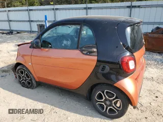 2016 Smart fortwo Passion с VIN WMEFJ5DA7GK066701, выставлен на аукционе Copart как лот 59093055 с пробегом 84 417 миль миль и Списание • Salvage title. История ставок и продаж доступна на DreamBid. Изображение 2.