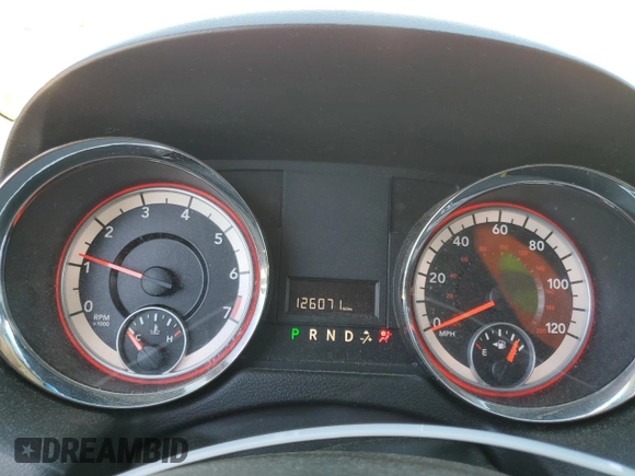 2013 Dodge Grand Caravan SXT with VIN 2C4RDGCG0DR582254, listed as a Copart auction lot 54735205 with 126,071 mi miles and Salvage Title. Bid and sale history available at DreamBid. Image 9.