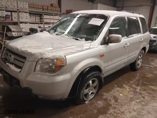 2006 Honda Pilot EX with VIN 2HKYF18416H563715, listed as a IAAI auction lot 41362167 with 162,611 mi miles. Bid and sale history available at carsss.com. Image 2.