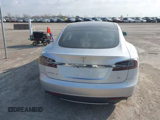 2013 Tesla Model S with VIN 5YJSA1CG3DFP28908, listed as a IAAI auction lot 41804041 with 140,756 mi miles and . Bid and sale history available at DreamBid. Image 16.