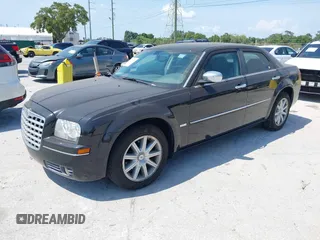 2010 Chrysler 300 Touring with VIN 2C3CA5CV7AH284713, listed as a IAAI auction lot 42221918 with 121,389 mi miles and . Bid and sale history available at DreamBid. Image 2.